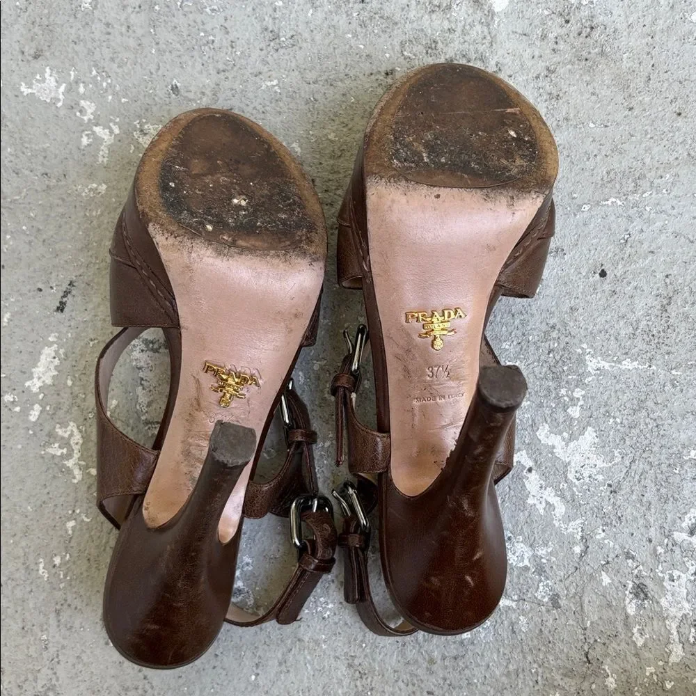Prada crisscross open toe platforms